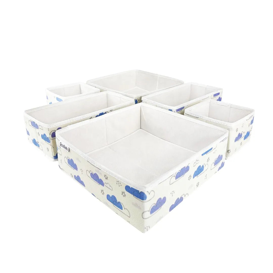 Functional and aesthetic baby storage bins arranged on wardrobe shelf