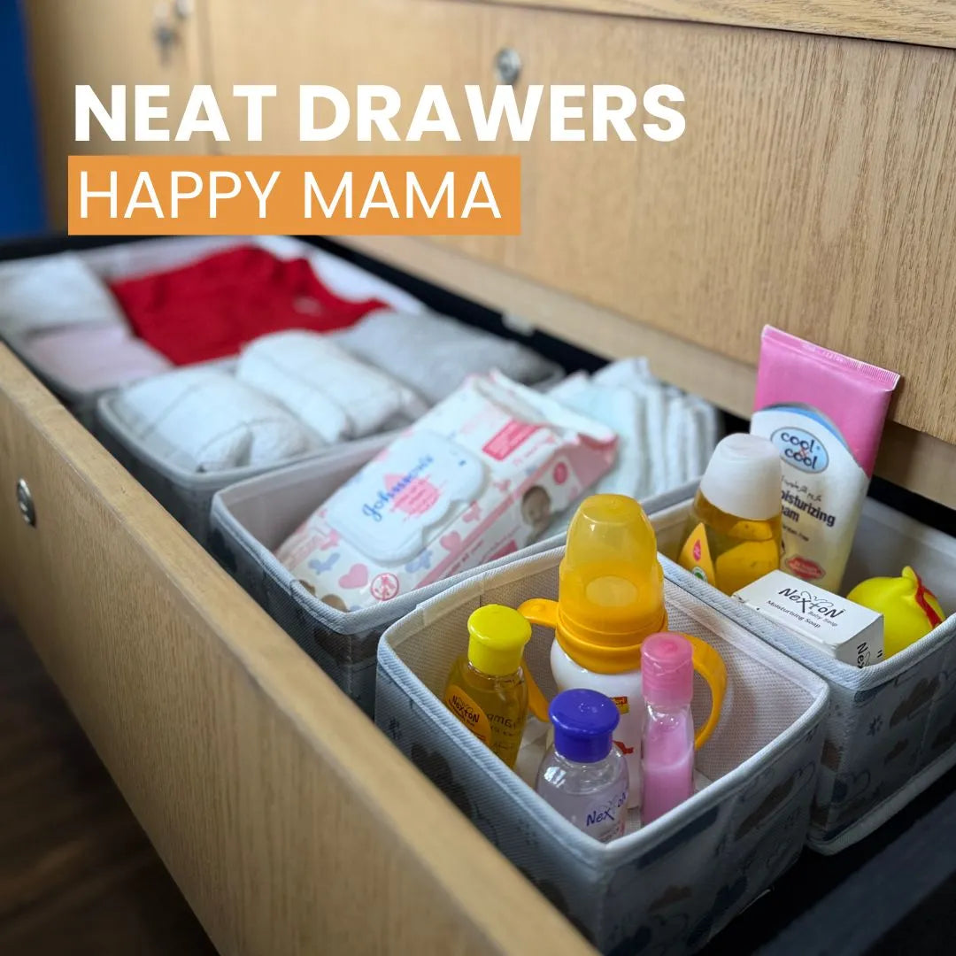 Qoolish baby clothes and toy organizer boxes filled with newborn essentials – perfect for sorting baby items in drawers or on shelves.