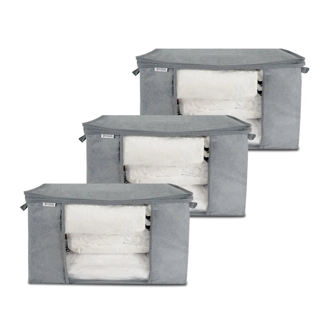 Set of 3 grey printed horizontal storage bags with handles, ideal for underbed storage of clothes, bedding, and linens.