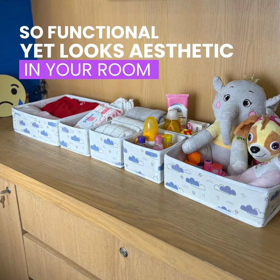 Organized baby drawer with products like bottles, diapers and clothes