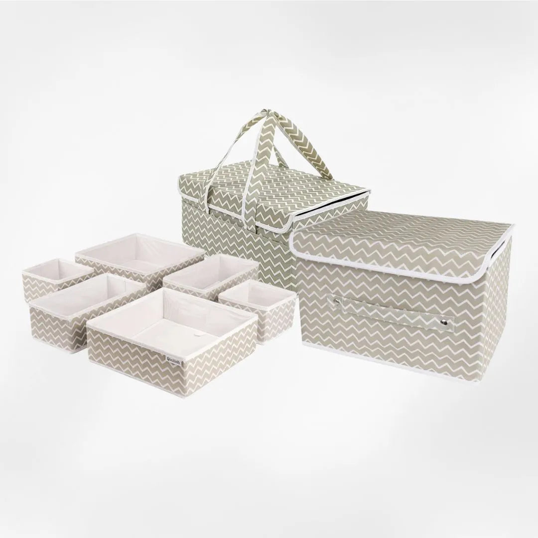 White striped diaper caddy with baby drawer organizer and clothes storage box