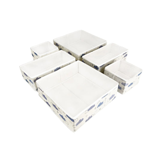 Space-saving drawer storage baskets in lightweight fabric with printed clouds