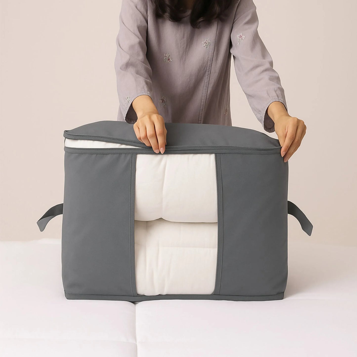 Fabric storage bag for seasonal clothes used as stylish room organizer