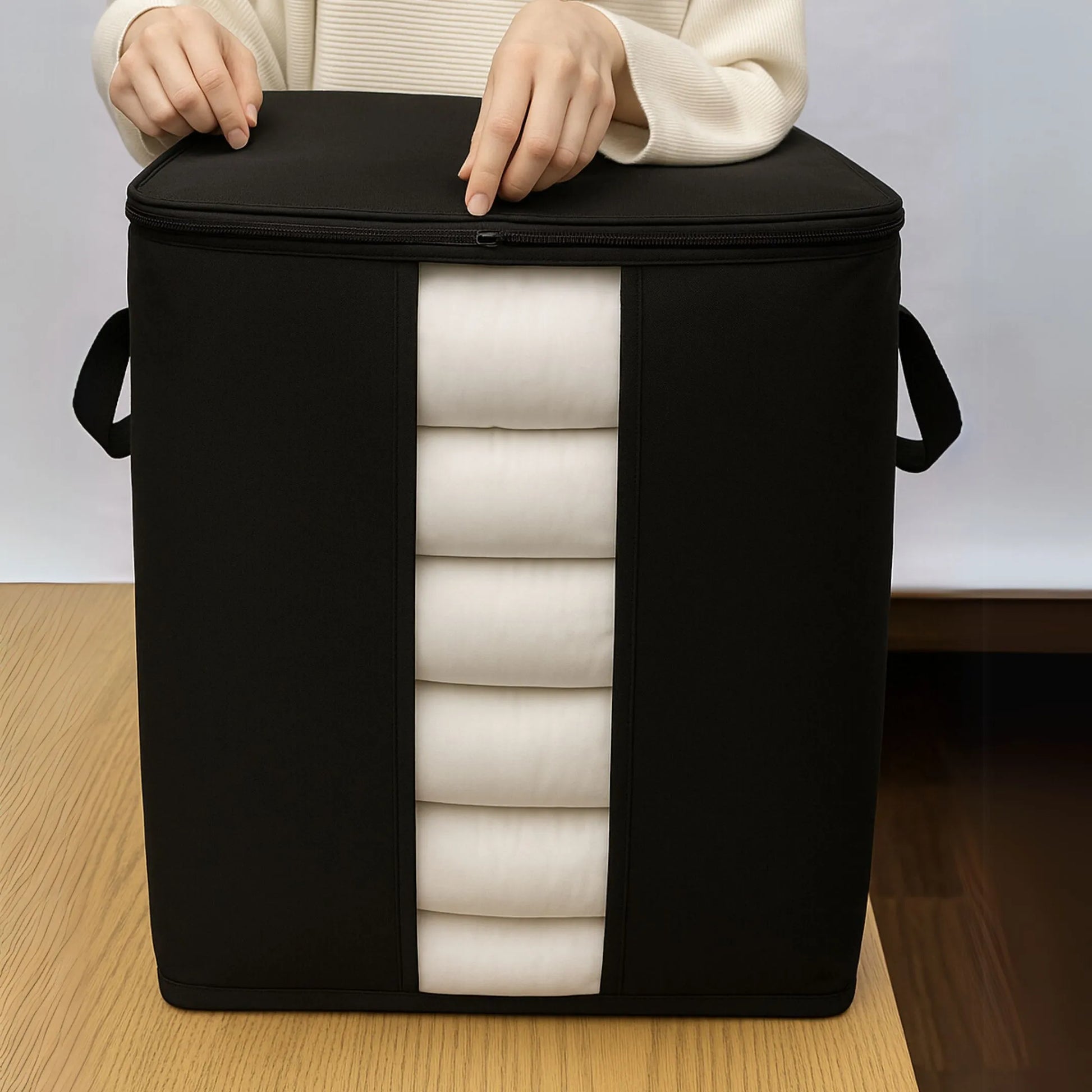 Black Qoolish organizer bag placed neatly inside a wardrobe for storage